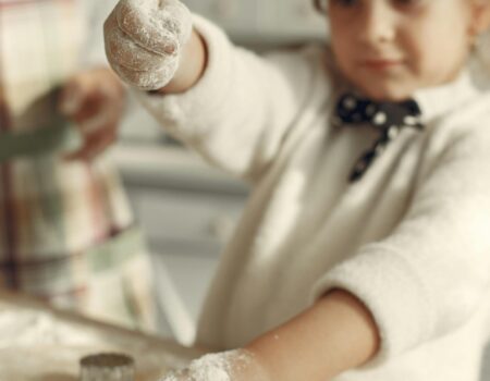 Family spending simple school holidays at home – teaching kids money lessons with accountant in Motueka